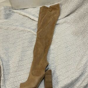 Size 6 Aldo knee boot. Big leg friendly. Never worn tan in color